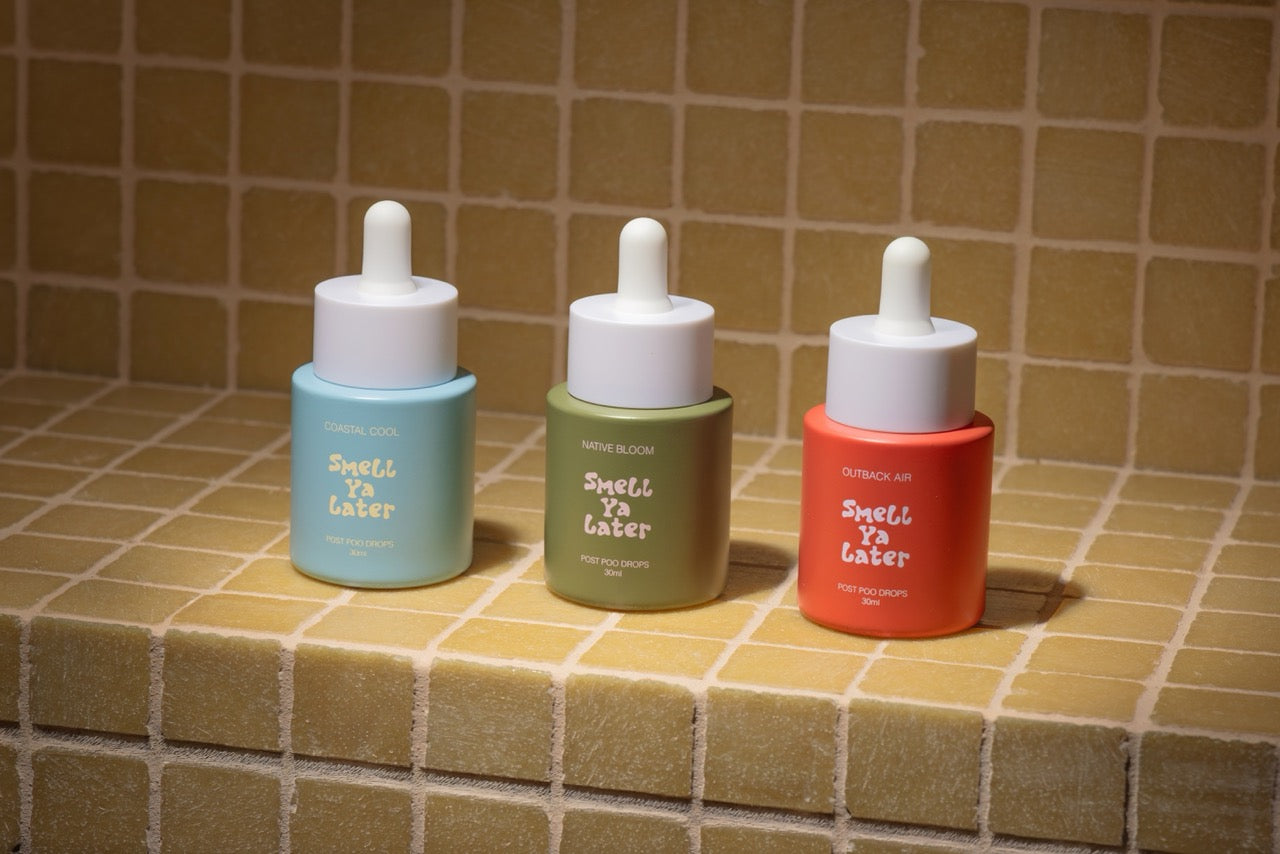 Three dropper bottles labeled 'Smell Ya Later' on a tiled surface.
