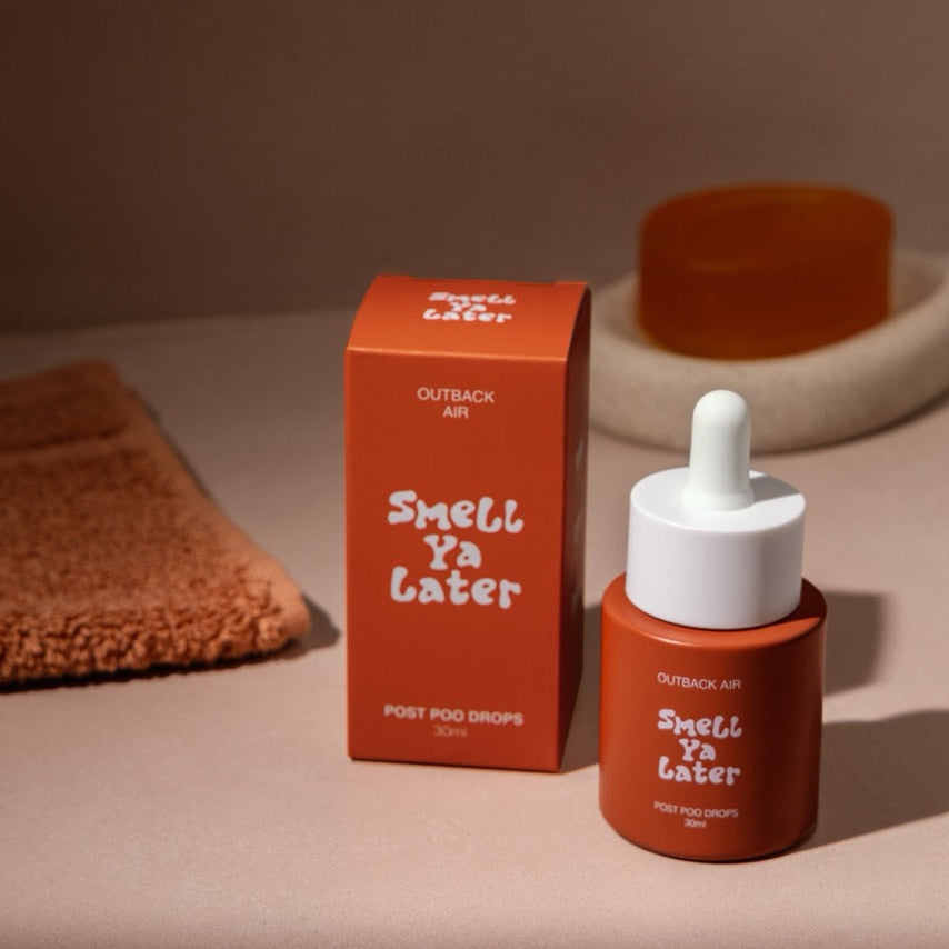 Bottle and packaging of 'Smell Ya Later' product on a neutral background